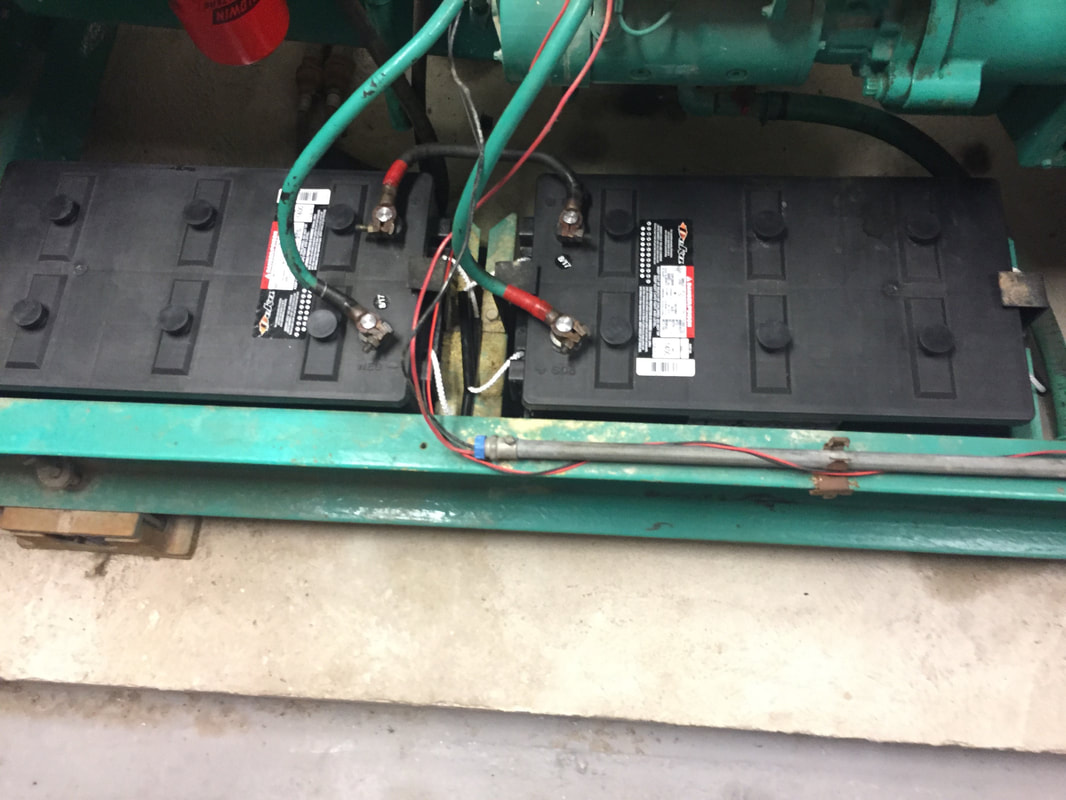 The two batteries that help start the generator